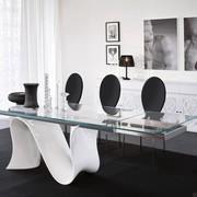 Wave table with sinuous central base available in twelve different dimensions (extension rail finish not available)