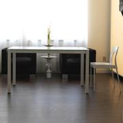 Self custom table with an extra-clear glass top and a glossy white painted steel structure