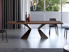 Prora extending table by Bonaldo with central metal base and solid walnut top with straight edge