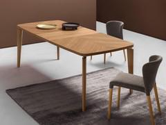 Nelia modern wooden table with carpentry workmanship on the top