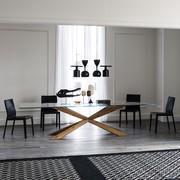 Spyder glass table up to three meters long by Cattelan