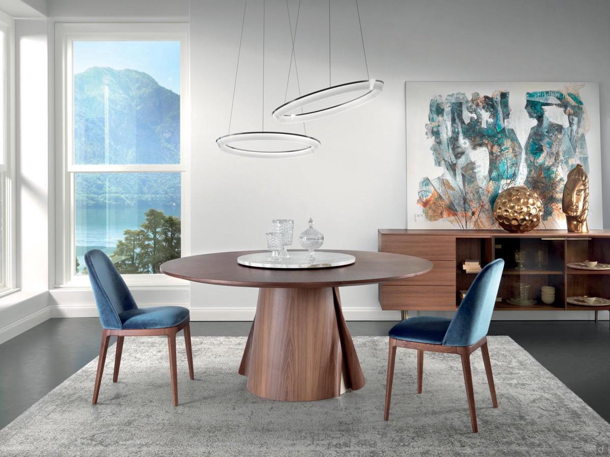 Round living room table Velum with central wooden base and metal details