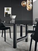 Round pivot in smoked glass with asymmetrical base in brushed charcoal ash