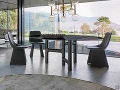 Pivot fixed table by Bonaldo in the round version with smoked crystal glass top