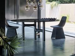 Pivot table by Bonaldo with metal inserts in wooden base. Customisable finish