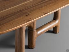 American walnut for both the top and the base also embellished with decorative metal elements