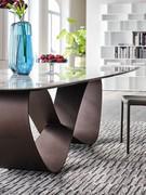Bronze embossed metal base, one of the finishes available to customise your Butterfly table