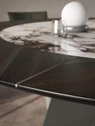 Detail of the outer frame in Canaletto walnut or burnt oak, with central revolving insert in keramik stone