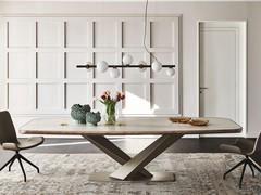 Stratos table with crossed structure and rounded lower profile