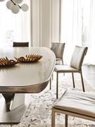 Bevelled, rounded bottom edge in brushed bronze matt lacquer