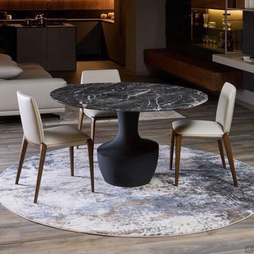 Round table with central base in Anfora stone