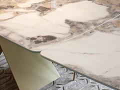 Delicate division between top and extension that merge together to create a single surface