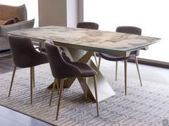 Trevor table in extendable version with glossy gold beauty ceramic glass top, extension in matching colour, champagne painted metal base