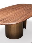 Detail of the soap bar profile on Cattelan's Papelito table in Canaletto Walnut