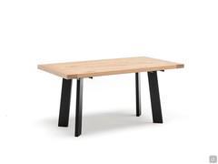 White view of the Montevideo industrial-style table: appreciate the contrast between the wooden top and the rectangular metal legs painted black