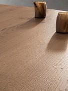 The detail of the top shows the expert craftsmanship, with surface brushing