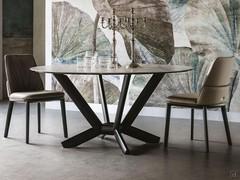 Planer round table with Keramik top and black embossed metal base