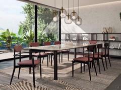 Elegant Lewis dining table with dark solid wood legs combined with fine Iris Heaven marble
