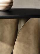 Detail of Luxor bronze brushed metal legs and wooden top with solid wood edge