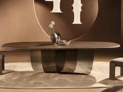 Alisio table, with partially overlapping base to create a special play of light between the fired glass plates