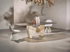 Bronze fired glass and travertine marble base define a unique artistic style