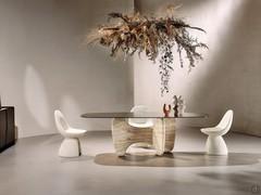 Design simplicity enhances the value of noble materials such as stone and glass 