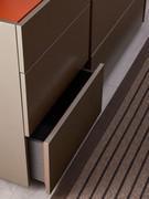 Opening a drawer of the Cleveland dresser, facilitated by the lacquered side nailing. The interior of the drawers is also in linen grey fabric effect melamine