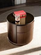 Lido round wooden bedside table by Cattelan with Canaletto walnut veneer surfaces