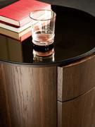 Detail showing the thickness of the fronts of the two drawers, skilfully machined on the edge to fit perfectly with the circular surface of the structure
