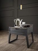 Sierra Nightstand in Terracotta Oak, predominantly black but with contrasting light-coloured parts