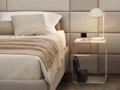 Clearly visible is the curved bedside table structure, composed of a single 0.2 cm thick painted metal plate