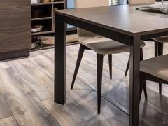 45° angled legs give a more refined touch to the Adrian table (top finish not available)