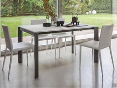 Adrian table with ceramic top and metal legs