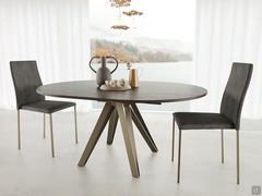 Station round table with folding extensions in modern living 