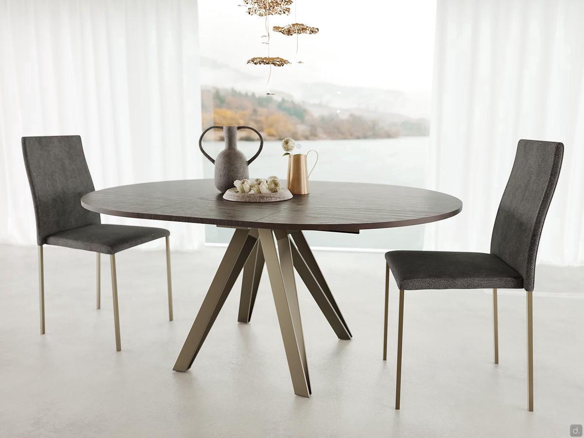 Station round table with folding extensions in modern living 