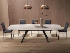 Ludwig extending dining room table with marble-effect Laminam ceramic top and double under-top side extension