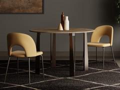 Space table with 120 cm extendable round top. Melamine melamine top and painted metal base