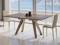 Station extending table in square version (rectangular when extended), here proposed with champagne metal frame