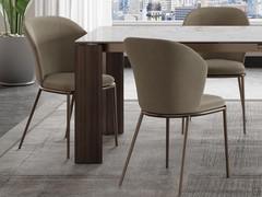 Vertical brushed bronze metal leg. Refined combination with blanc de blanc matt ceramic glass top
