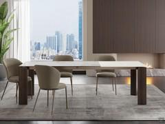 Rog table Matt blanc de blanc ceramic glass top White melamine veneer extensions and vertical brushed bronze painted metal legs