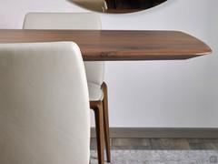 Detail side view showing the shaped profile of the 4 cm thick solid walnut top