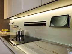 Details in the working area of the Numa Eleven white and gold kitchen