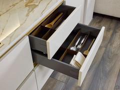 Drawers in the white and gold kitchen Numa Eleven