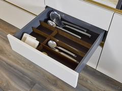 Drawers in the white and golden kitchen Numa Eleven
