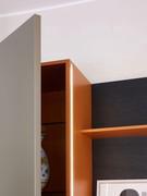 The side LED bar runs milled along the entire height of the container column