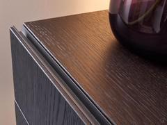 Detail of the Plan wall-mounted storage unit with two drawers, which can be opened by means of a practical mocha shine painted metal groove in the thickness of the fronts