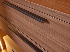Detail of the painted metal handles in Umber Shine finish, supplied as standard with each Wide drawer unit (floor-standing or suspended)