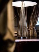 Detail of tapered base in ribbed blown glass