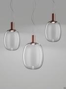 Lamps Riflesso in small and large versions with a satin copper tip