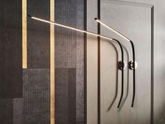 Fisherman adjustable wall lamp by Cattelan, here proposed in black embossed metal finish